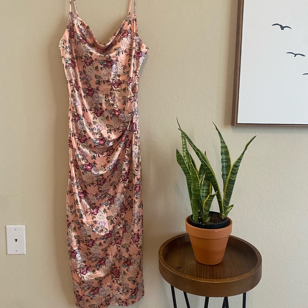 This is a satin Molly Green (size S) dress great for any occasion.